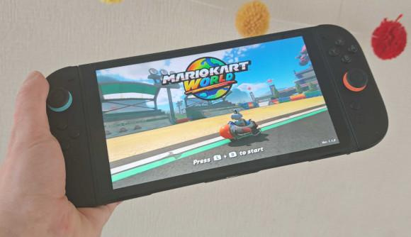 Custom image for Nintendo Switch 2 review in progress showing the console running Mario Kart World in the reviewers hand